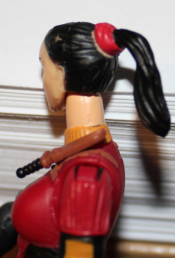 From this pic you can see that the paint in her is not perfect, i do not know how common this is, but since it's black it's easy to fix.  Also this knife is not removable. 